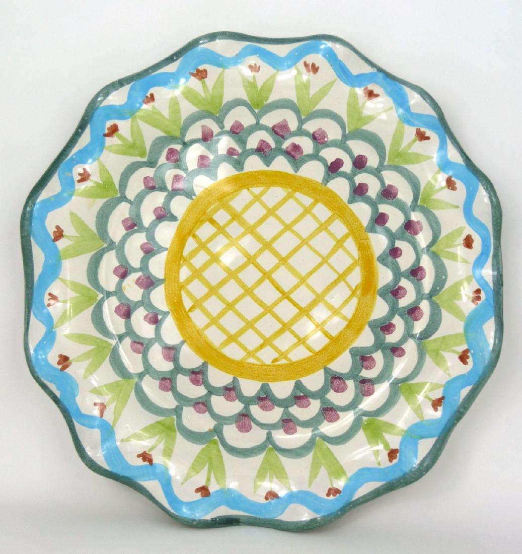 2pc MACKENZIE CHILDS REDWARE TABLE OBJECTS: 2 piece of Mackenzie-Childs Redware pottery including a serving dish and bowl. Each hand painted in vibrant colors and impressed to underside. Largest measures 12 1/2" (31.5cm) diameter.