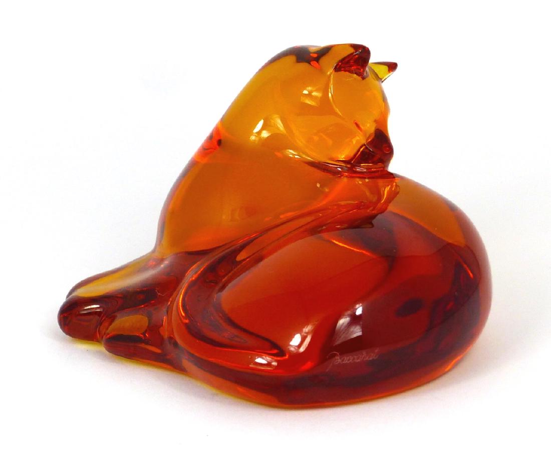 BACCARAT 'GINGER' AMBER CRYSTAL CAT SCULPTURE: Baccarat amber crystal 'Ginger' cat figurine. Marked to underside. Measures 4 5/8" (11.7cm) length.
