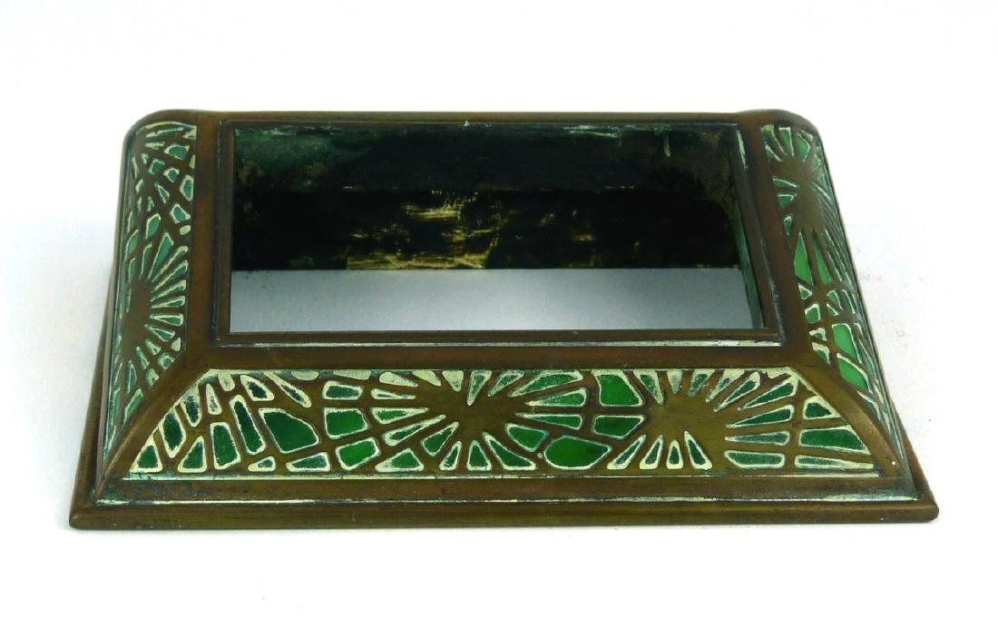 TIFFANY STUDIOS 'PINE NEEDLE' BRONZE CALENDAR: Tiffany Studios bronze and glass calendar in the 'Pine Needle' pattern. Marked to underside. Measures 4 5/8" (11.7cm) length.