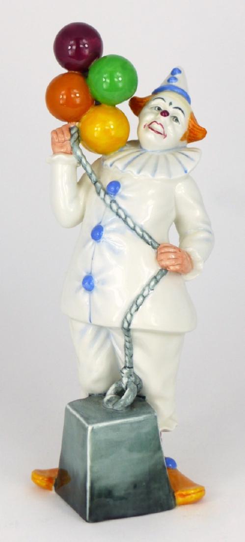 ROYAL DOULTON CLOWN PORCELAIN FIGURINE: Royal Doulton porcelain figure titled 'Balloon Clown' #2894. Marked to underside. Measures 9 1/4" (23.5cm) height.