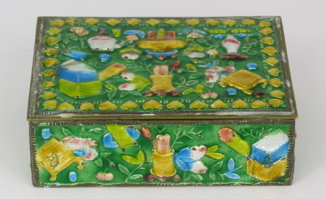 CHINESE ENAMELED BOX: Chinese enameled brass box of rectangular form decorated with Buddhist symbols. Measures 4 1/8" (10.5cm) length.