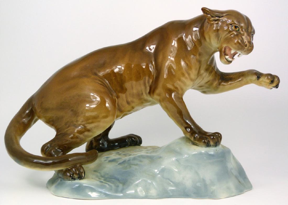 LARGE BESWICK PORCELAIN PANTHER FIGURINE: Large Beswick porcelain figure of a panther on rock. Marked to underside. Measures 12 1/2" (31.5cm) length.