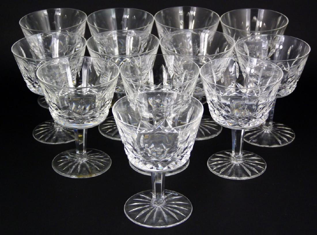 12pc WATERFORD LISMORE CRYSTAL PORT WINE GOBLETS: 12 Waterford cut crystal port wine glasses in the 'Lismore' pattern. Each marked to underside and measures 4 1/4" (10.8cm) height. Three goblets having small diameter base.