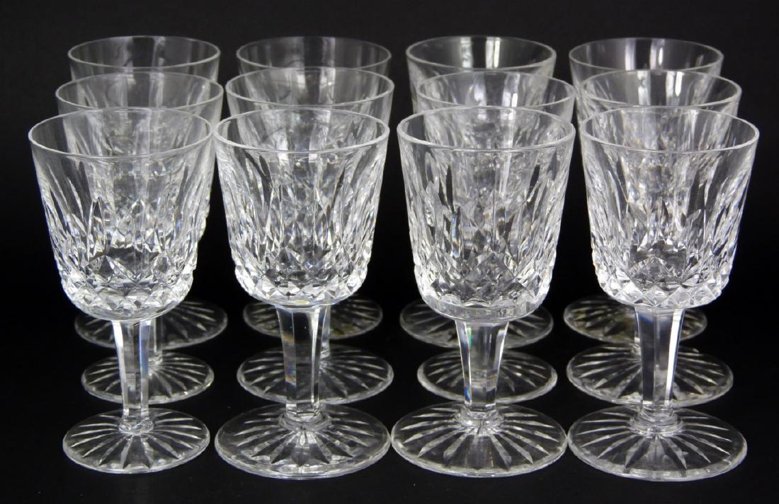 12pc WATERFORD LISMORE CRYSTAL LIQUOR COCKTAILS: 12 Waterford cut crystal liquor cocktail glasses in the 'Lismore' pattern. Each marked to underside and measures 4 1/8" (10.5cm) height.