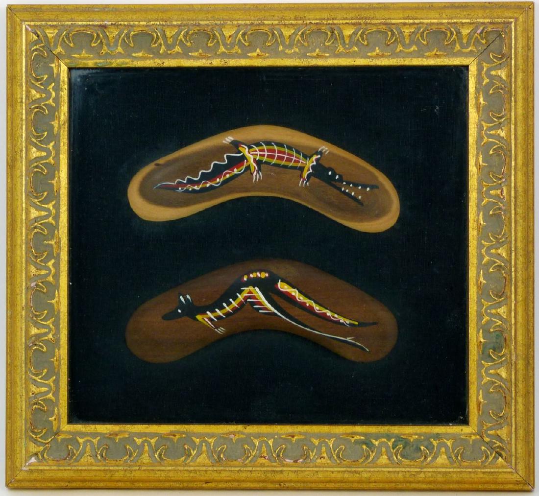 PR ABORIGINAL HAND PAINTED BOOMERANGS: Two Aboriginal hand painted boomerangs depicting an alligator and a kangaroo. Each measures 6 1/4" (15.8cm) length. Frame measures 12 1/4" (31.1cm) x 11 1/4" (28.5cm).