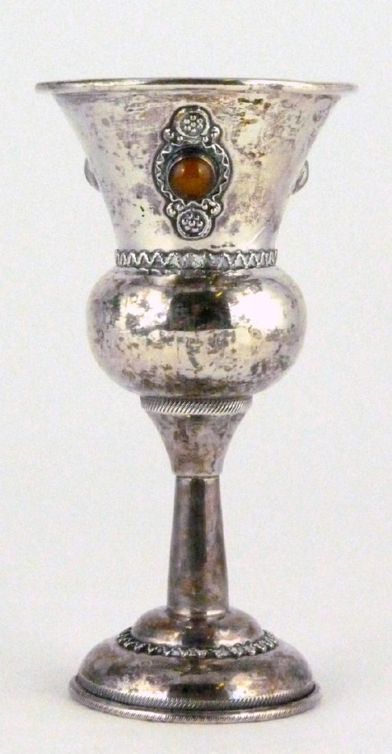 BEN-ZION STERLING SILVER KIDDUSH CUP w STONES: Ben-Zion sterling silver kiddush cup decorated with semi-precious stones and wirework. Marked to inside Ben-Zion, Sterling, Israel. Measures 4 1/4" (10.8cm) height. Total weight 1.6ozt (51.5g).