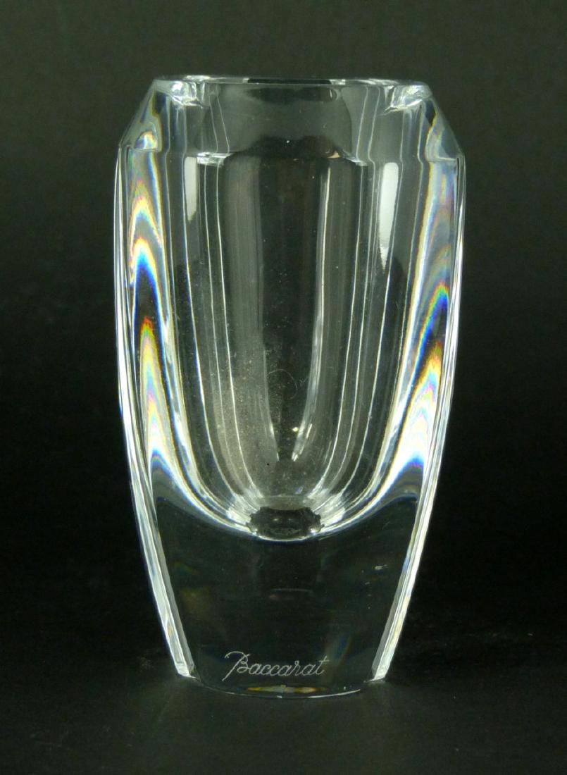 BACCARAT CRYSTAL VASE: Baccarat crystal vase having vertical line design. Marked to underside. Measures 3 3/4" (9.5cm) height.