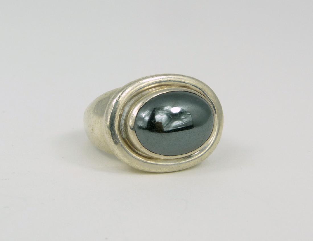PALOMA PICASSO FOR TIFFANY STERLING HEMATITE RING: Paloma Picasso for Tiffany & Company sterling silver ring with hematite cabochon. Marked Paloma Picasso, Tiffany & Co, 925. Cabochon measures approx 18mm x 13mm. Ring size 7.5.
