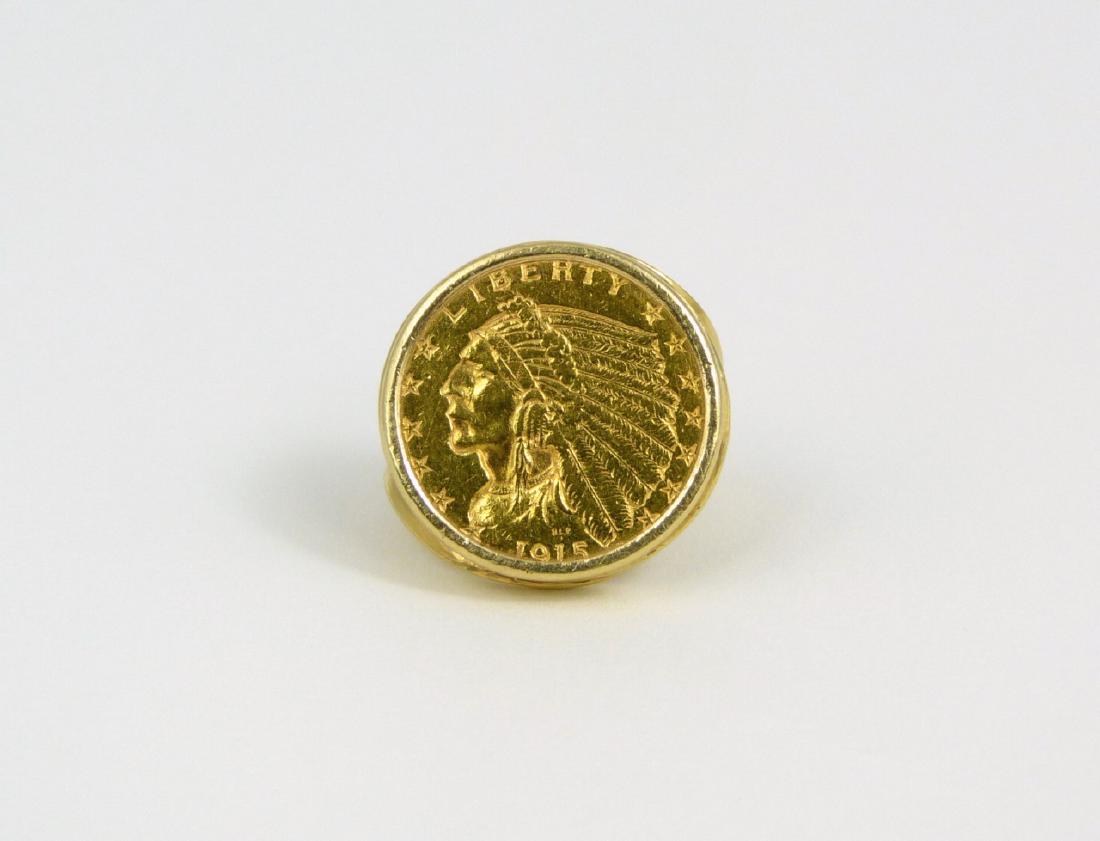 1915 2 1/2 DOLLAR INDIAN HEAD GOLD COIN RING: 1915 US 2.5 Dollar Indian Head gold coin mounted as a ring. 14kt yellow gold setting. Ring size 4. Total weight 5.9dwt (9.1g).