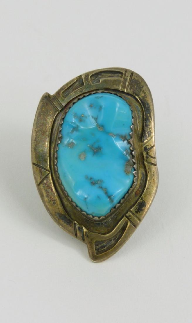K. DALE NAVAJO STERLING SILVER & TURQUOISE RING: Navajo sterling silver and turquoise ring. Signed 'K. DALE'. Ring size 7.5. Face of ring measures approx 38mm length.