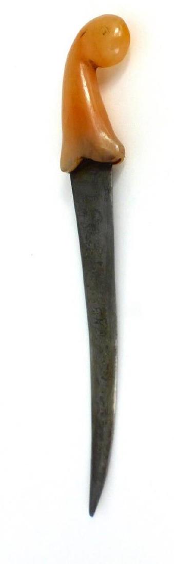 MUGHAL STYLE DAGGER w DAMASCENED BLADE: Mughal style dagger having a carved hardstone handle in the form of a bird and damascus blade. Measures 6 3/4" (17.2cm) length.