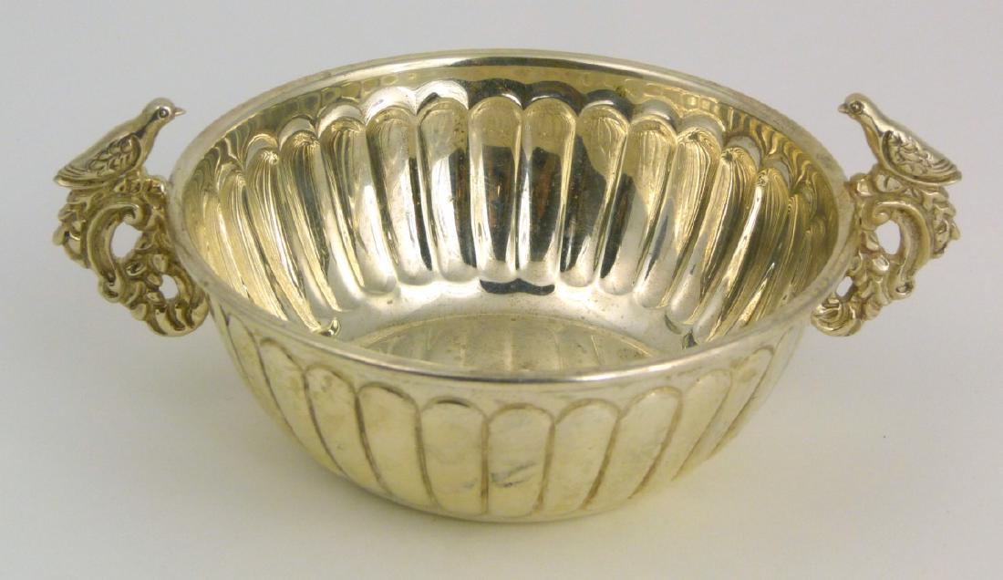 TANE MEXICAN STERLING SILVER BIRD BOWL: Tane Orfebres Mexican sterling silver bowl with bird-form handles. Marked to underside Tane, Mexico, 0925, MT.01. Measures 5 1/8" (13cm) width. Total weight 3.7ozt (116.3g).