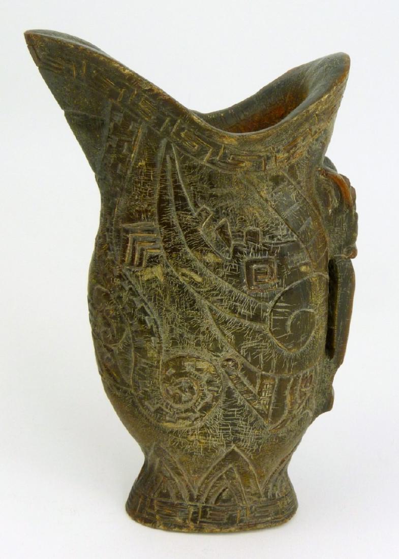 CHINESE CARVED BOVINE HORN LIBATION CUP: Chinese hand carved ox horn libation cup. Measures 6 1/4" (15.8cm) height.