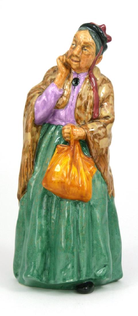 ROYAL DOULTON 'BRIDGET' PORCELAIN FIGURINE: Royal Doulton 'Bridget' porcelain figure #2070. Marked to underside. Measures 7 3/4" (19.7cm) height.