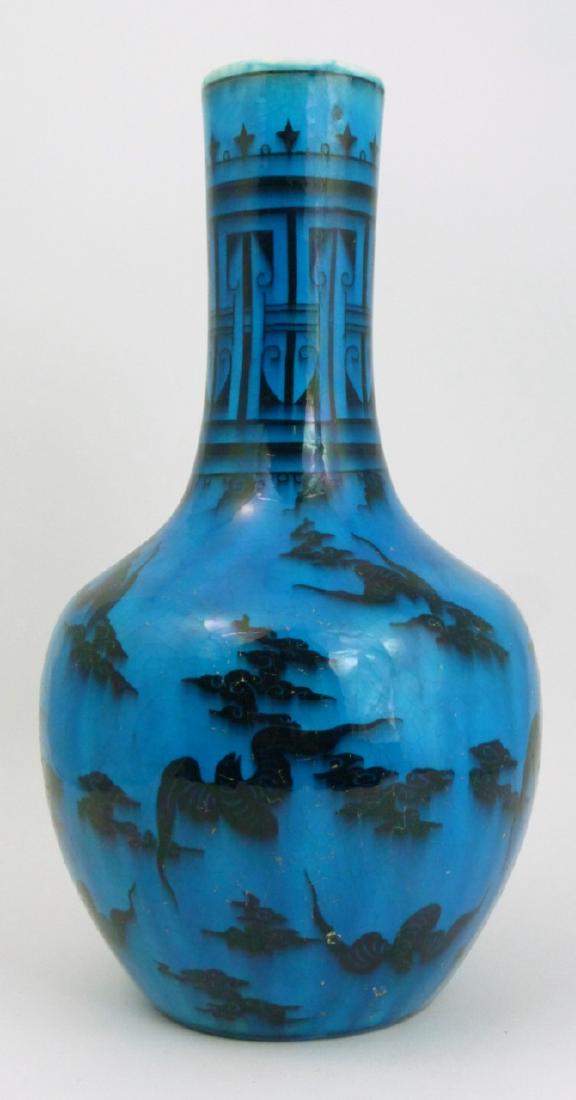 MINTON TURQUOISE GLAZED PORCELAIN BAT VASE: Minton Chinoiserie porcelain vase depicting bats and clouds on a turquoise ground. Marked and impressed to underside. Measures 10 3/4" (27.4cm) height.
