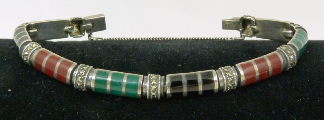 STERLING SILVER, MARCASITE, ONYX & JASPER BRACELET: Sterling silver and marcasite bracelet inlaid with black onyx, green onyx and jasper. Marked 925 to clasp. Measures approx 7 1/2" (19cm) length.