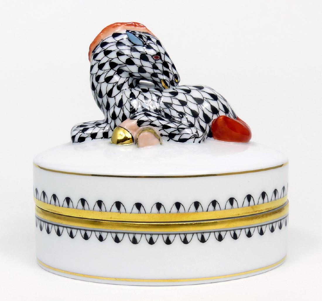 HEREND ZEBRA PORCELAIN BOX: Herend Hungarian porcelain covered box with recumbent zebra to cover. Marked to underside. Measures 3 1/2" (8.8cm) width.