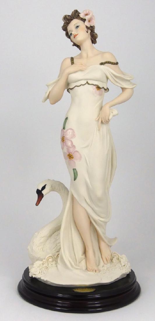 GIUSEPPE ARMANI 'ENCHANTED LAKE' FIGURINE w BOX: Giuseppe Armani figure depicting a lady with swan. Titled 'Enchanted Lake'. Signed to base and holds original labels to underside. Includes original box. Figure measures 13 1/2" (34cm) height.