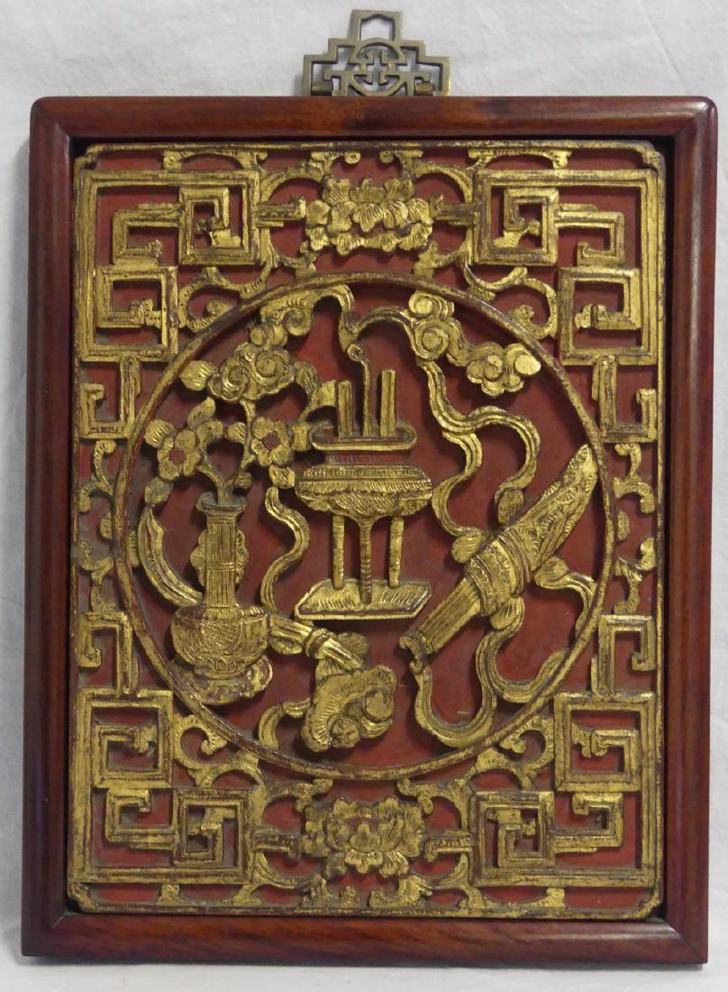 CHINESE CARVED, GILT & LACQUERED PANEL: Chinese relief carved gilt and red lacquered Buddhist panel. Holds wax seal to verso. Measures 15 3/4" (40cm) x 12 1/2" (31.5cm).