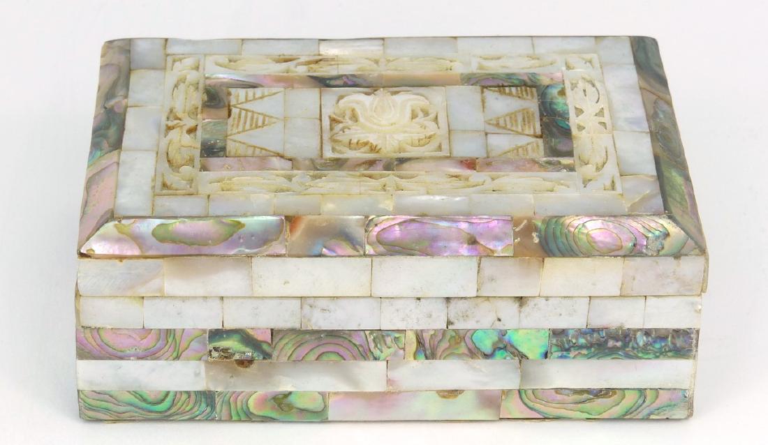 MOTHER OF PEARL & ABALONE INLAID BOX: Mother of pearl and abalone inlaid box. Measures 5 1/4" (13.3cm) length.