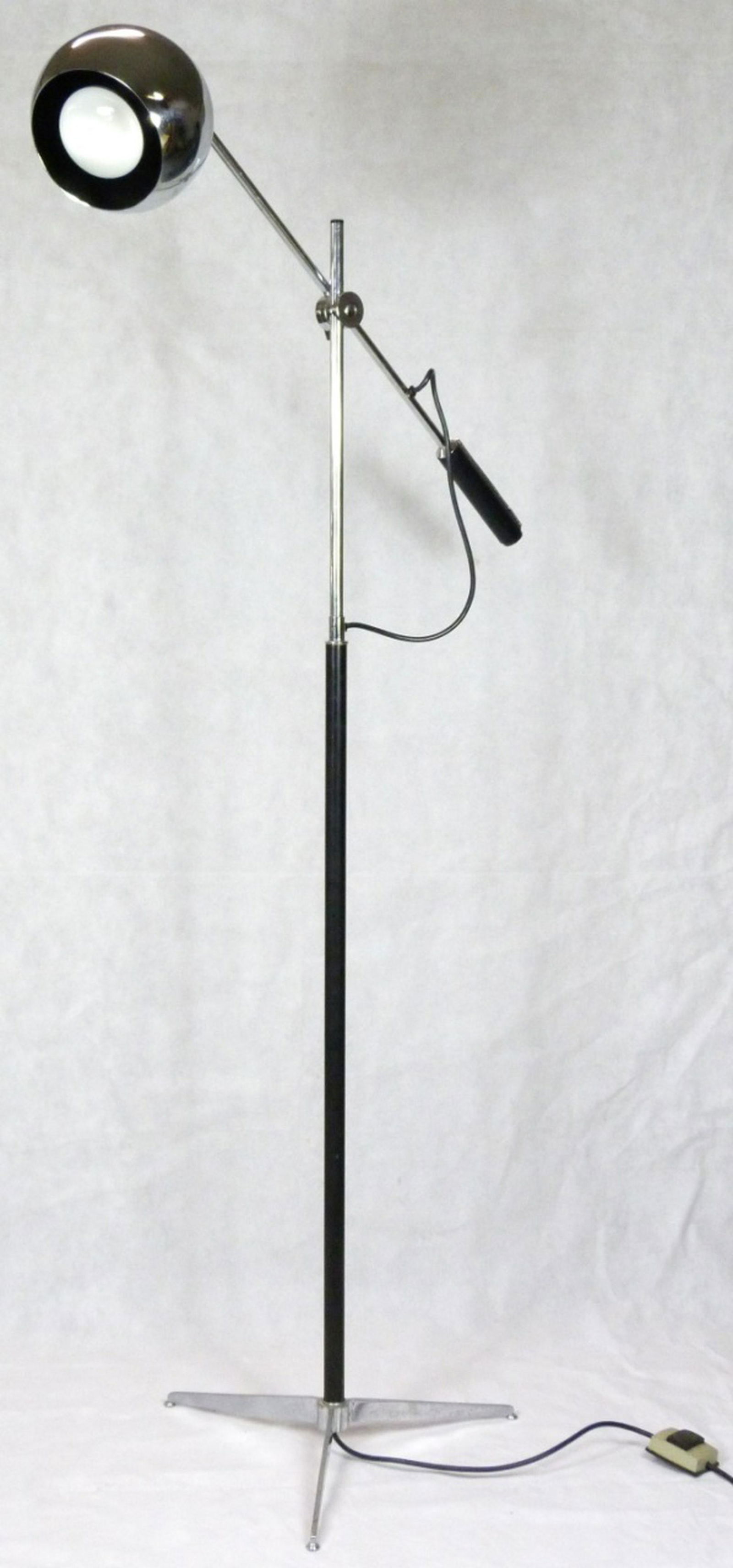 ROBERT SONNEMAN ORBITER FLOOR LAMP: Robert Sonneman mid-century modern chromed light on an adjustable metal arm with leather wrapped handle on cylindrical base with tripod foot. Measures 64 1/2" height (163.9cm) x 29" (73.6cm) width in