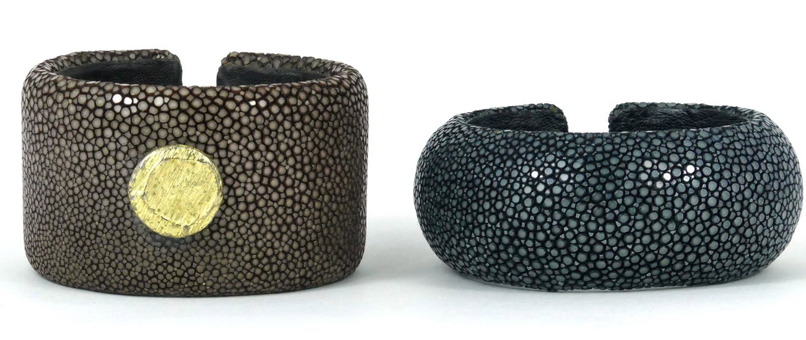 2pc SHAGREEN CUFF BRACELETS: 2 shagreen cuff bracelets, brown and grey. Each has an interior width of approximately 2 1/8" (5.4cm).