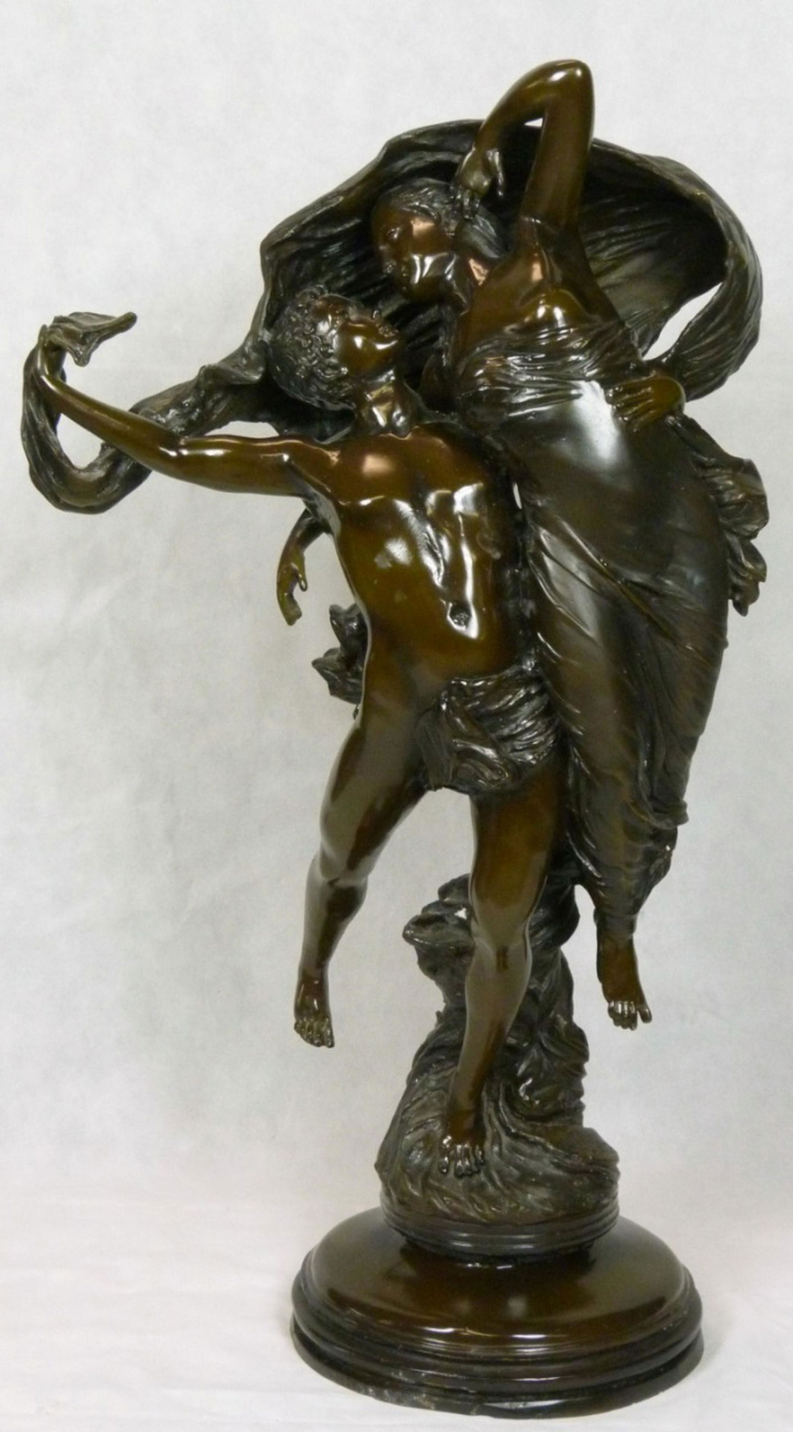 EUGENE MARIOTON 'DANCING LOVERS' BRONZE SCULPTURE: Bronze sculpture depicting two dancing lovers after Eugene Marioton. Signed to base. Measures 34 3/4" (88.3cm) height.