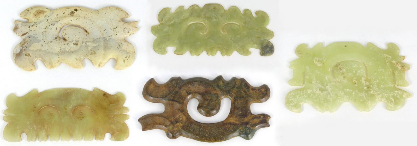 5pc CHINESE ARCHAISTIC JADE PENDANTS: Five Chinese Archaistic jade pendants. Largest measures 6 1/8" (15.5cm) length.