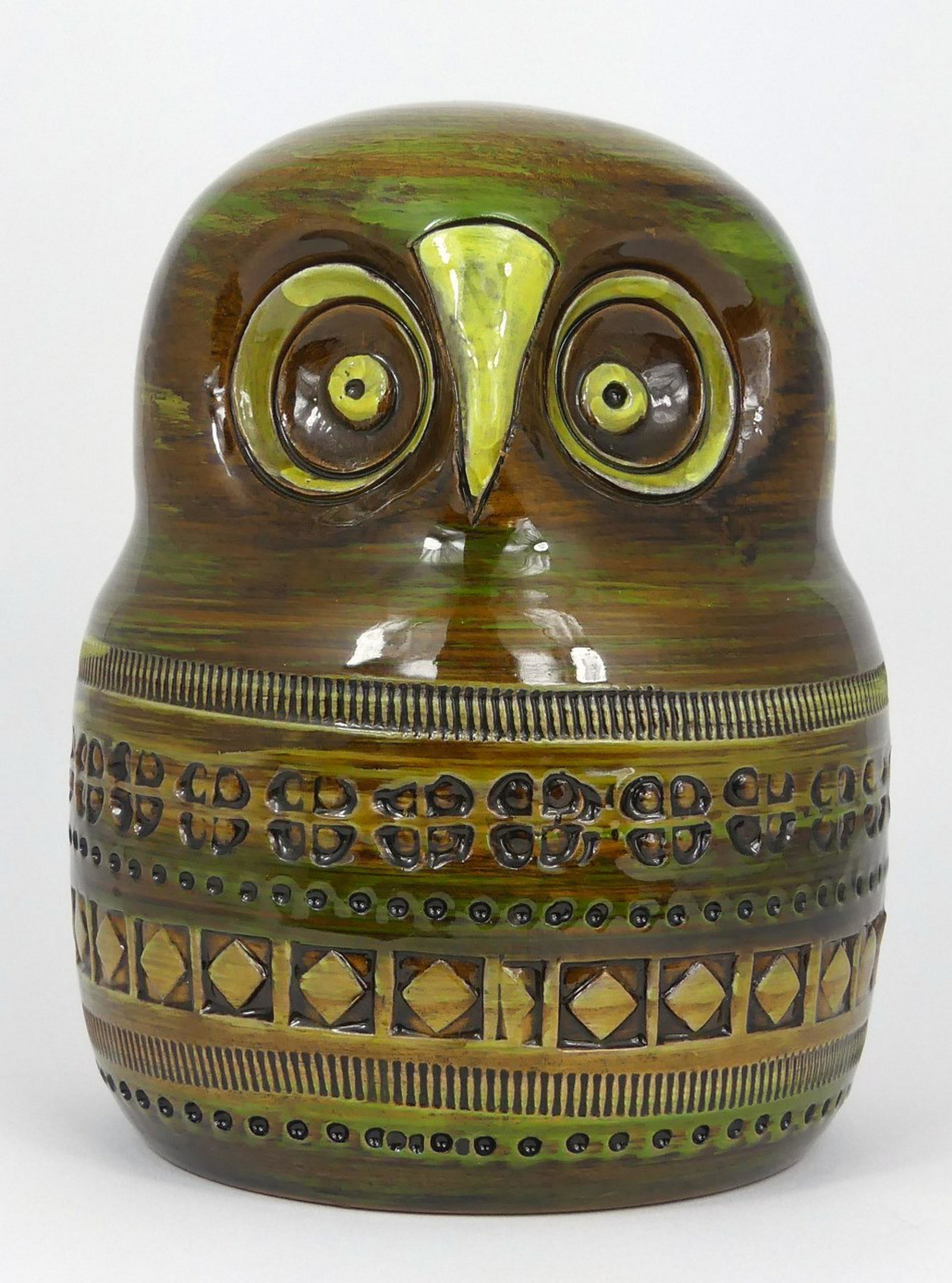 ITALIAN CERAMIC OWL: Italian glazed pottery owl. Marked to underside: Made in Italy expressly for Shillito's. Measures 6 1/2" (16.5cm) height.