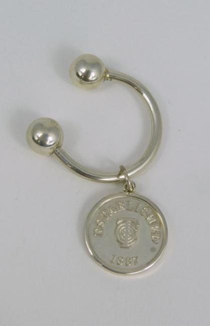 TIFFANY & CO STERLING ATLAS CLOCK KEY RING: Tiffany & Company sterling silver Atlas Clock key ring. Established 1837. Screw ball key ring measures 1 1/8" (2.8cm) width.