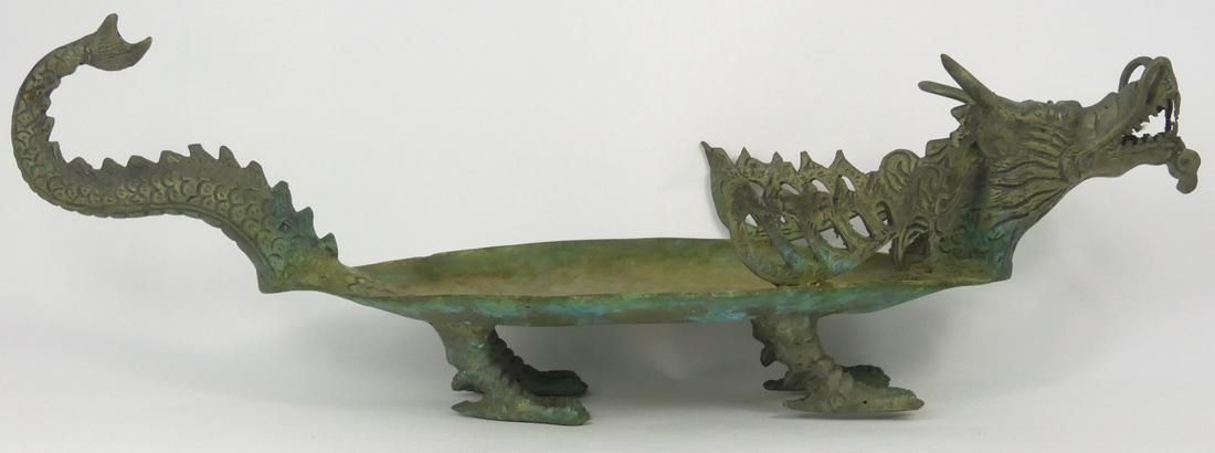 INDONESIAN BRASS DRAGON TRAY: Indonesian brass dragon tray. Measures 16 1/2" (41.8cm) length.