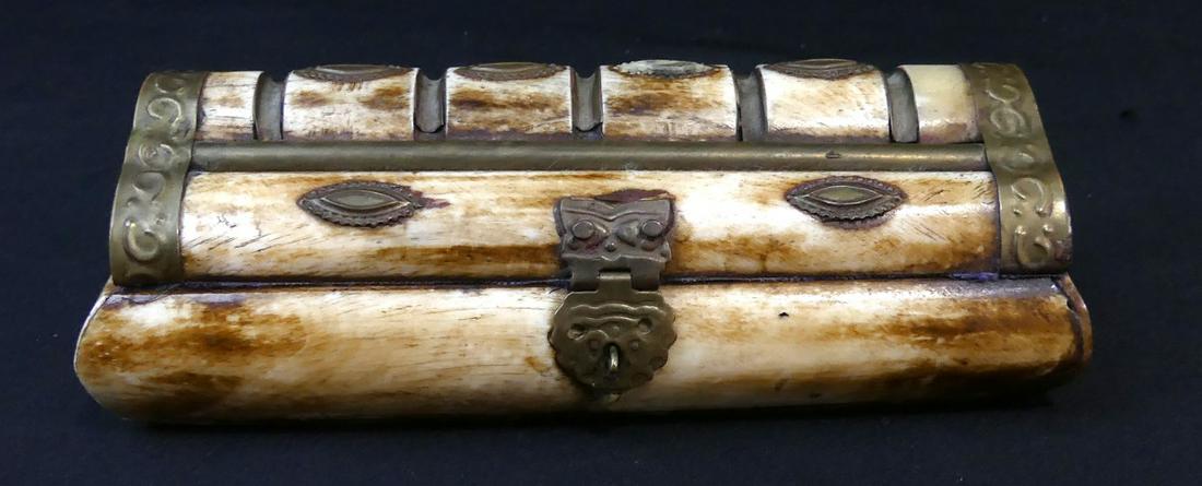 VINTAGE MIDDLE EASTERN CAMEL BONE & BRASS BOX: Vintage Middle Eastern camel bone box with brass hardware and accents. Measures 6 1/4" length.