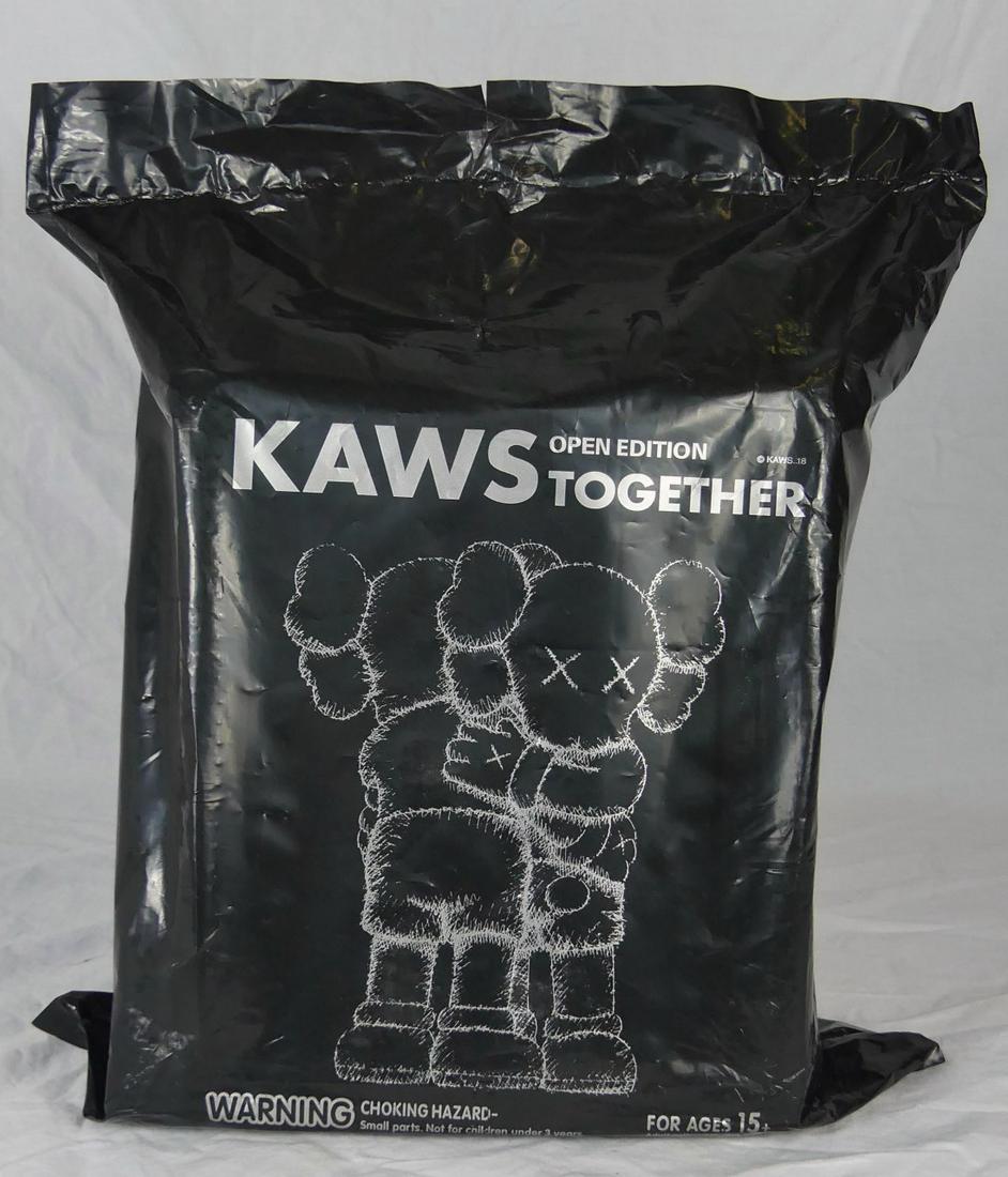 KAWS TOGETHER COMPANION BLACK 2018: KAWS aka Brian Donnelly (American, b. 1974) Together Companion double figure in Black. Painted cast vinyl. Marked Black above UPC code to verso. Sealed in original packaging measuring 11 1/2" x 9 1/4"