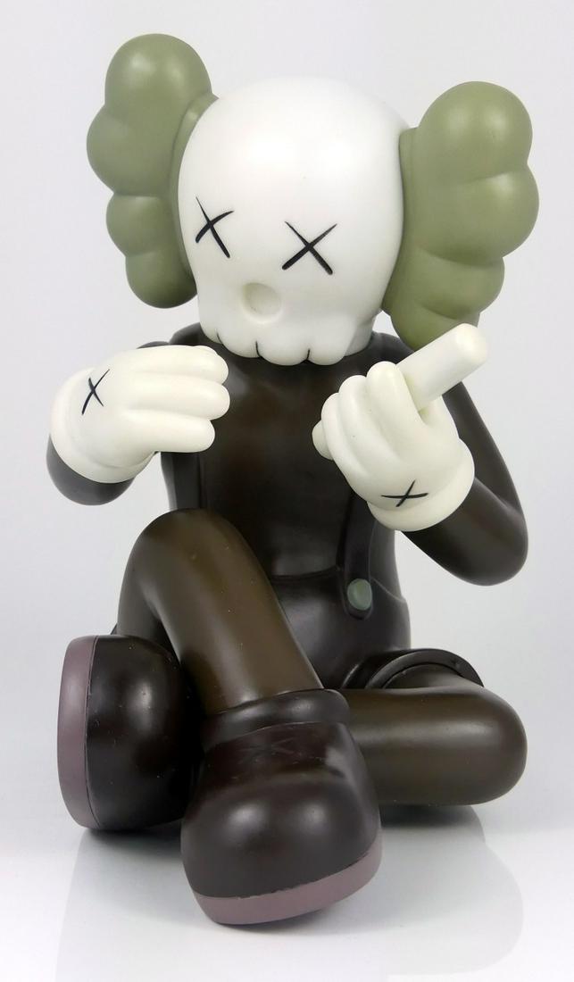 KAWS 'BETTER KNOWING' COMPANION BROWN 2013 w BOX: KAWS aka Brian Donnelly (American, b. 1974) Better Knowing Companion in brown. Painted cast vinyl. Marked Medicom Toy 2013 China and c. KAWS..13. Measures 8" height x 7 1/2" length. Includes original 