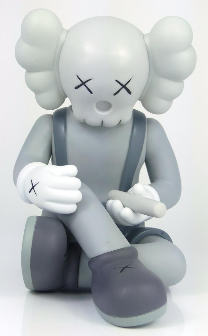 KAWS 'BETTER KNOWING' COMPANION GRAY 2013: KAWS aka Brian Donnelly (American, b. 1974) Better Knowing Companion in gray. Painted cast vinyl. Marked Medicom Toy 2013 China and c. KAWS..13. Measures 8" height x 7 1/2" length.