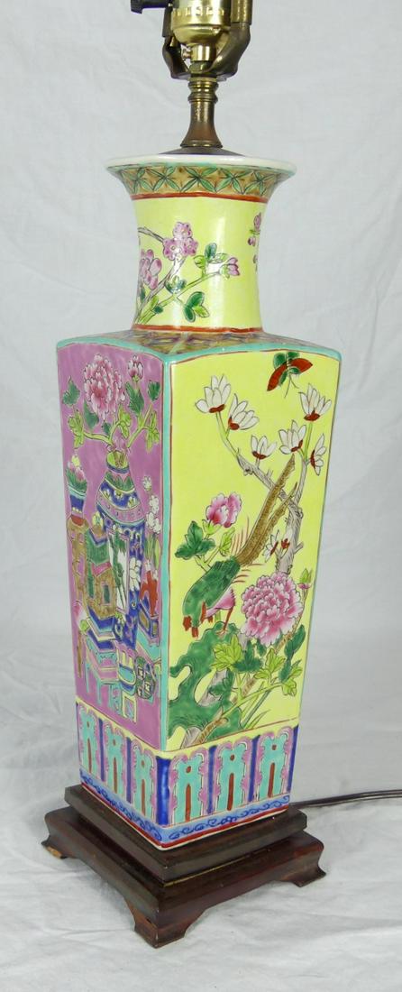 CHINESE FAMILLE ROSE PORCELAIN VASE LAMP: Chinese Famille Rose porcelain vase of squared form. Mounted as a lamp and decorated with flowers, birds, insects and vases. Porcelain measures 14" height. Lamp measures 28 1/2" overall height.
