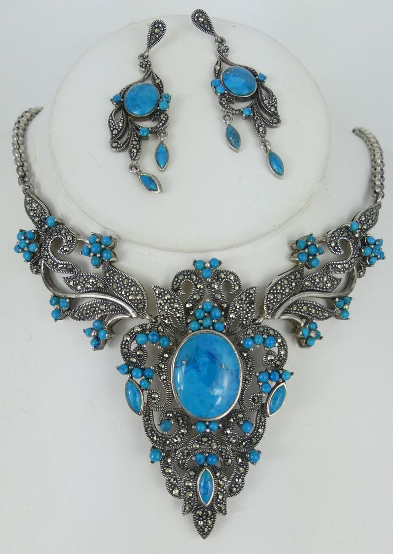 3pc STERLING SILVER TURQUOISE & MARCASITE SUITE: 3 piece suite including necklace and a pair of drop earrings. Each piece with turquoise and marcasite. Each marked 925. Necklace measures 18". Earrings measure 2 1/8" length.