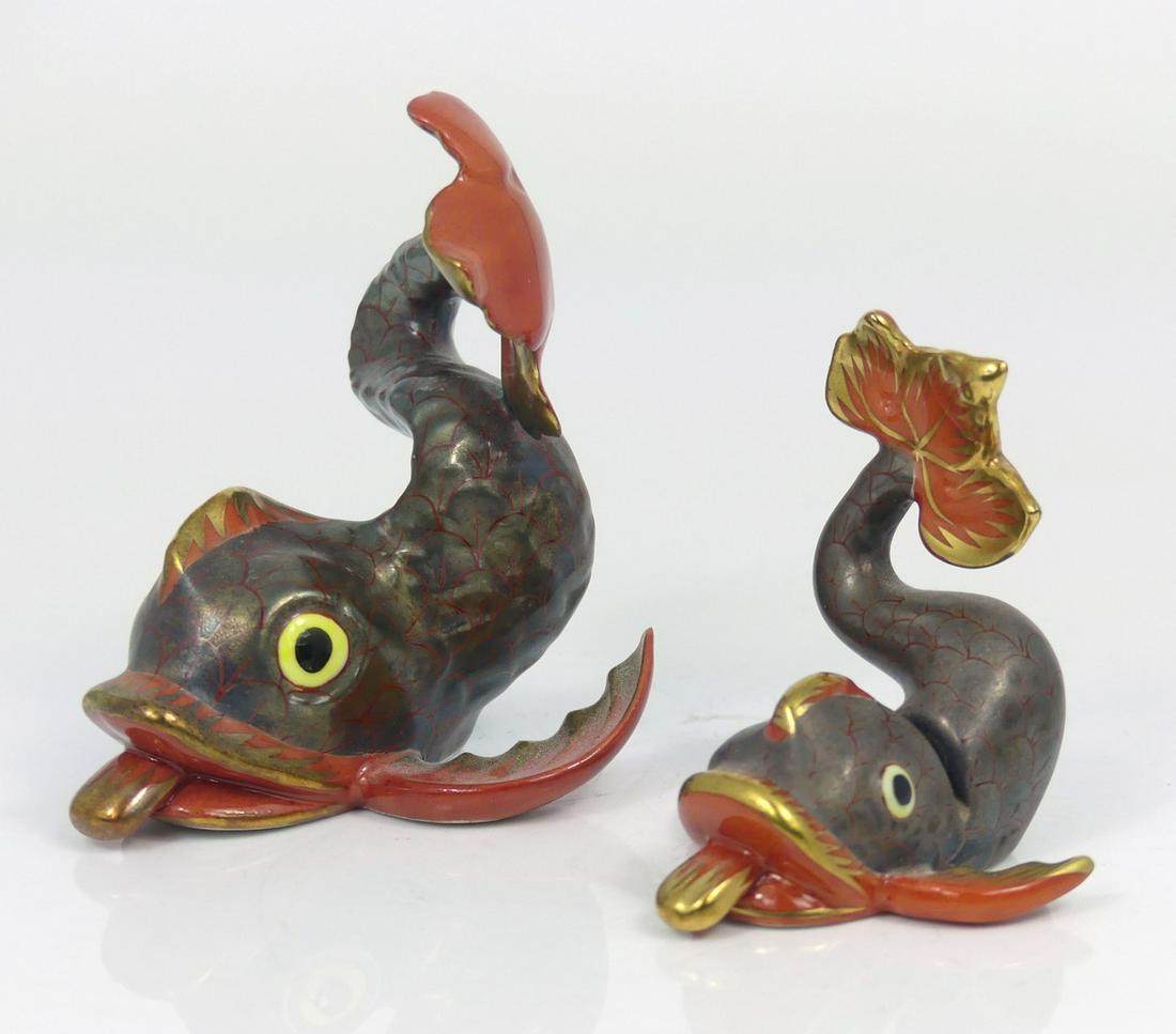 2pc HEREND PORCELAIN DOLPHIN FIGURINES: Two Herend porcelain dolphin figures. Each marked to underside. Largest measures 3" height and length.