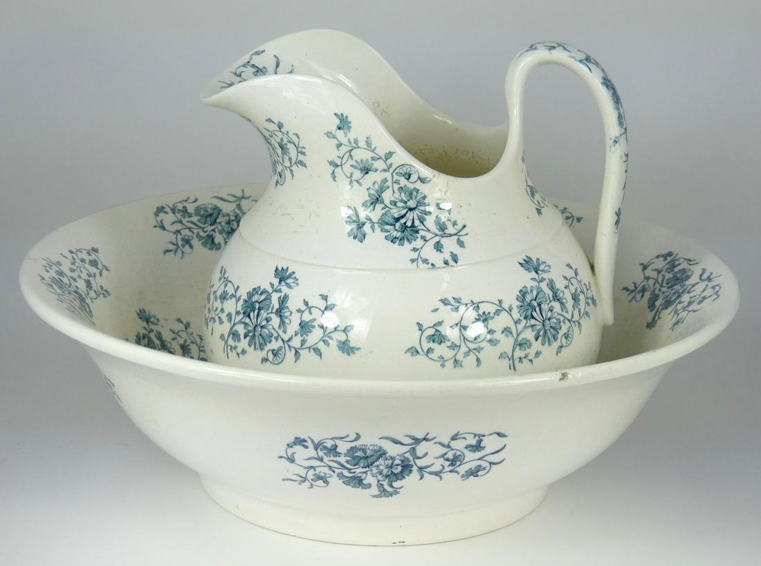 MINTONS CERAMIC WASH BOWL & PITCHER: Minton blue and white ceramic wash bowl and pitcher. Pitcher is marked and bowl is impressed to underside. Bowl measures 15 1/8" diameter.
