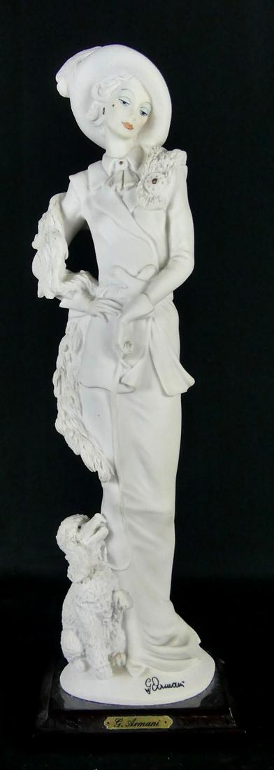 GIUSEPPE ARMANI 'LADY w POODLE' FIGURINE: Giuseppe Armani figure depicting a lady with poodle #0394. Marked to base. Measures 13 1/2" height.