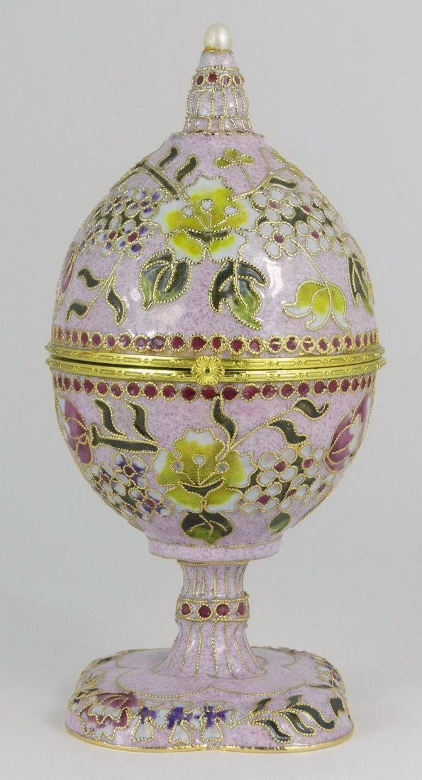 CHAMPLEVE ENAMELED EGG BOX w HINGED LID: Champleve enamel box in the form of an egg having hinged lid, gilt metal decoration and pearl finial. Measures 7 1/4" height.