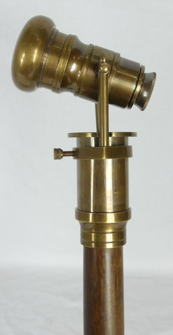 TELESCOPE CANE BRASS & WOOD: Walking stick cane with brass telescope handle. Measures 38 1/4" length.