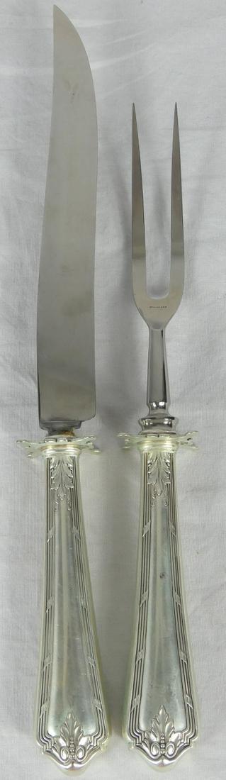 2pc RUSSELL WOODWARD ROCHAMBEAU STER CARVING SET: 2pc F. Russell Woodward for Watson carving set with fork and knife in the 'Rochambeau' pattern. Each hallmarked and marked sterling to handle and guard. Knife measures 13 1/2" length.