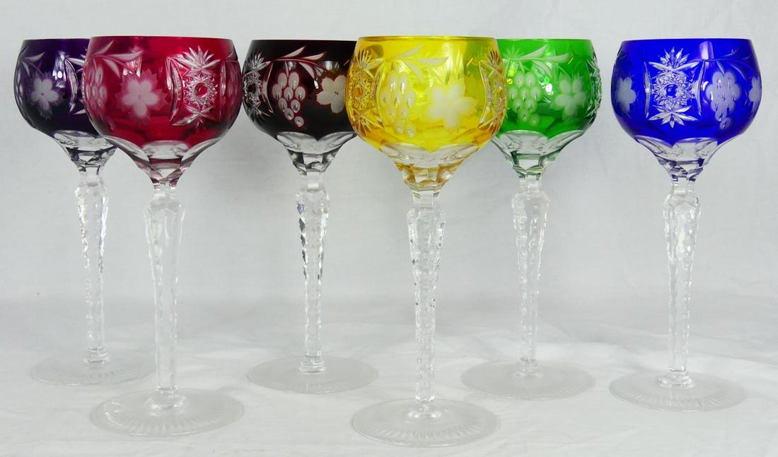 6pc BOHEMIAN CUT TO CLEAR CRYSTAL WINE GOBLETS: 6 Bohemian cut to clear crystal stemware wine goblets with grape pattern in various colors including amethyst, cranberry, cobalt, emerald, ruby and amber. Each measures 8 1/8" height.