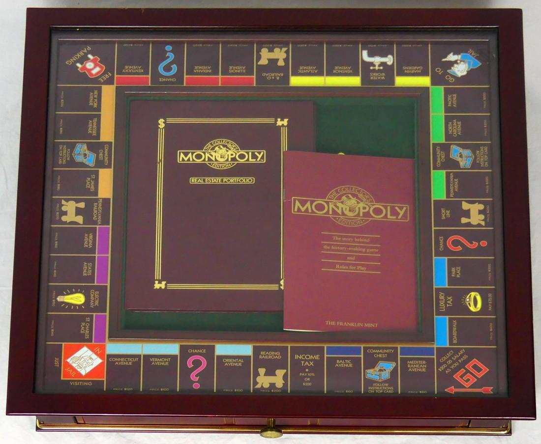 FRANKLIN MINT 'MONOPOLY' COLLECTOR'S EDITION: Monopoly Collector's Edition board game by the Franklin Mint. Wooden case measures 22" x 22".