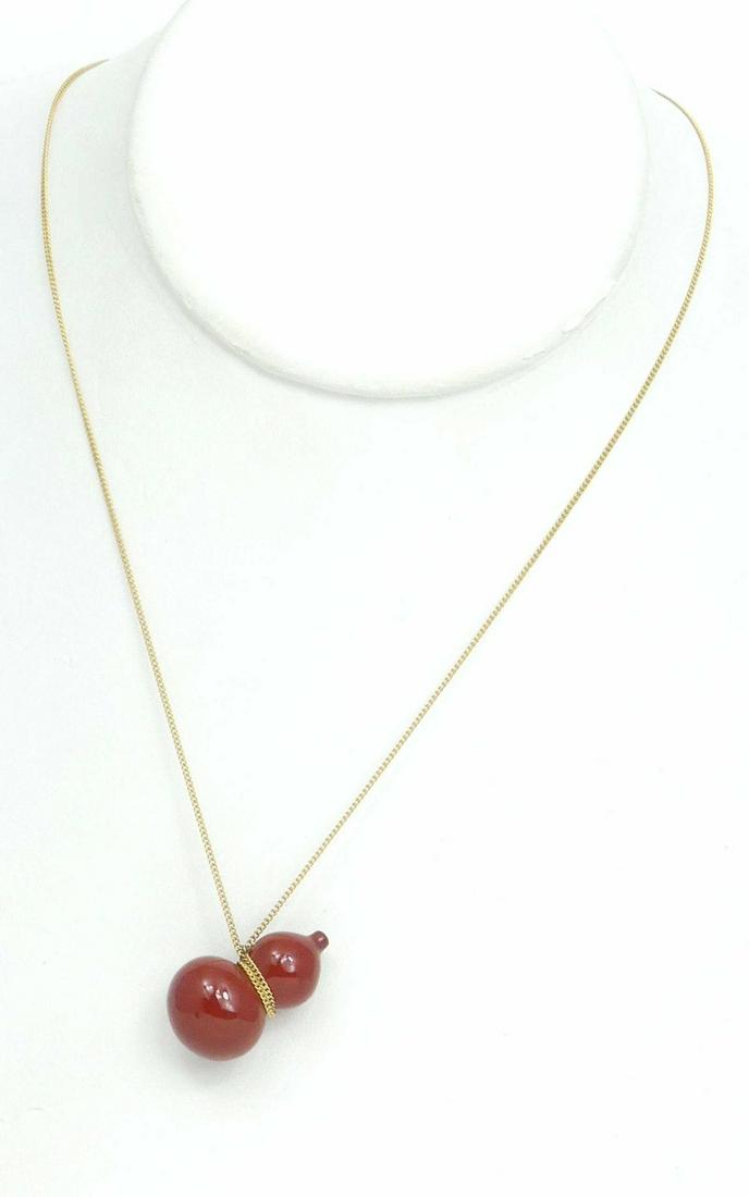 ANGELA CUMMINGS TIFFANY JASPER 'DOUBLE GOURD' 18kt: Angela Cummings for Tiffany & Company jasper double gourd pendant with 18kt yellow gold necklace. Jasper pendant measures 26mm. 18kt yellow gold chain measures 28" length.