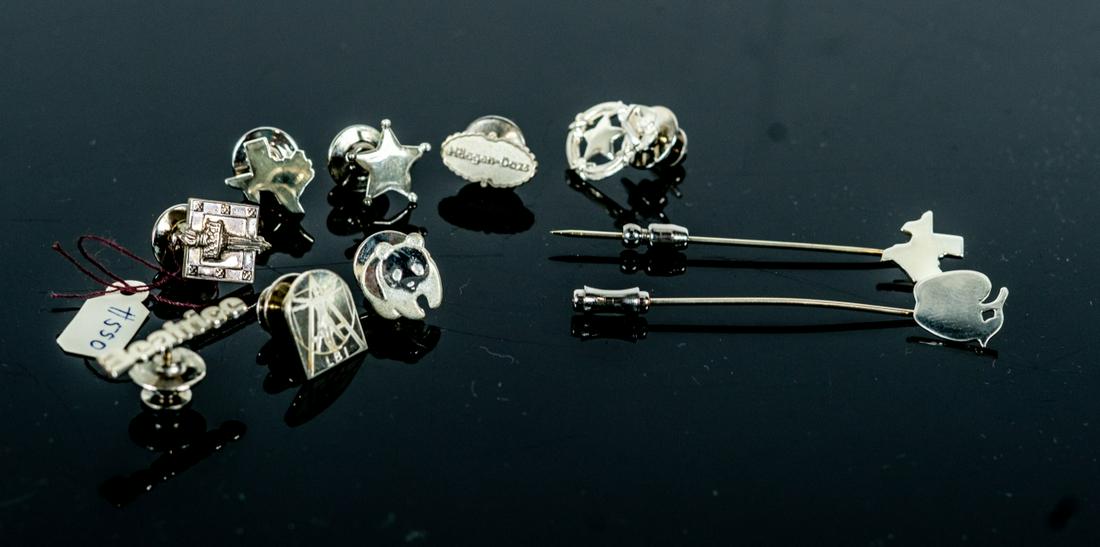 10pc TIFFANY & CO STERLINGS TIE TACKS & STICK PINS: Lot of 10 Tiffany & Company sterling silver pins. Includes 8 tie tacks: WWF Panda, Haagen Dazs, Beatrice, Texas, Star, Liberty Torch, Star inside wreath with eagle, LBI Da Vinci and 2 stick pins: Appl