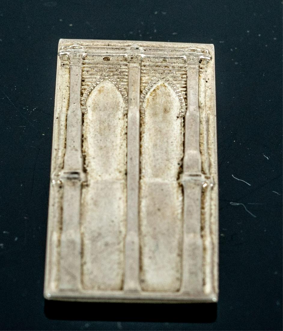 TIFFANY & CO 'BROOKLYN BRIDGE' STERLING MONEY CLIP: Tiffany & Company sterling silver money clip depicting the Brooklyn Bridge. Marked Tiffany & Co, Makers, Sterling. Measures 1 7/8" length.