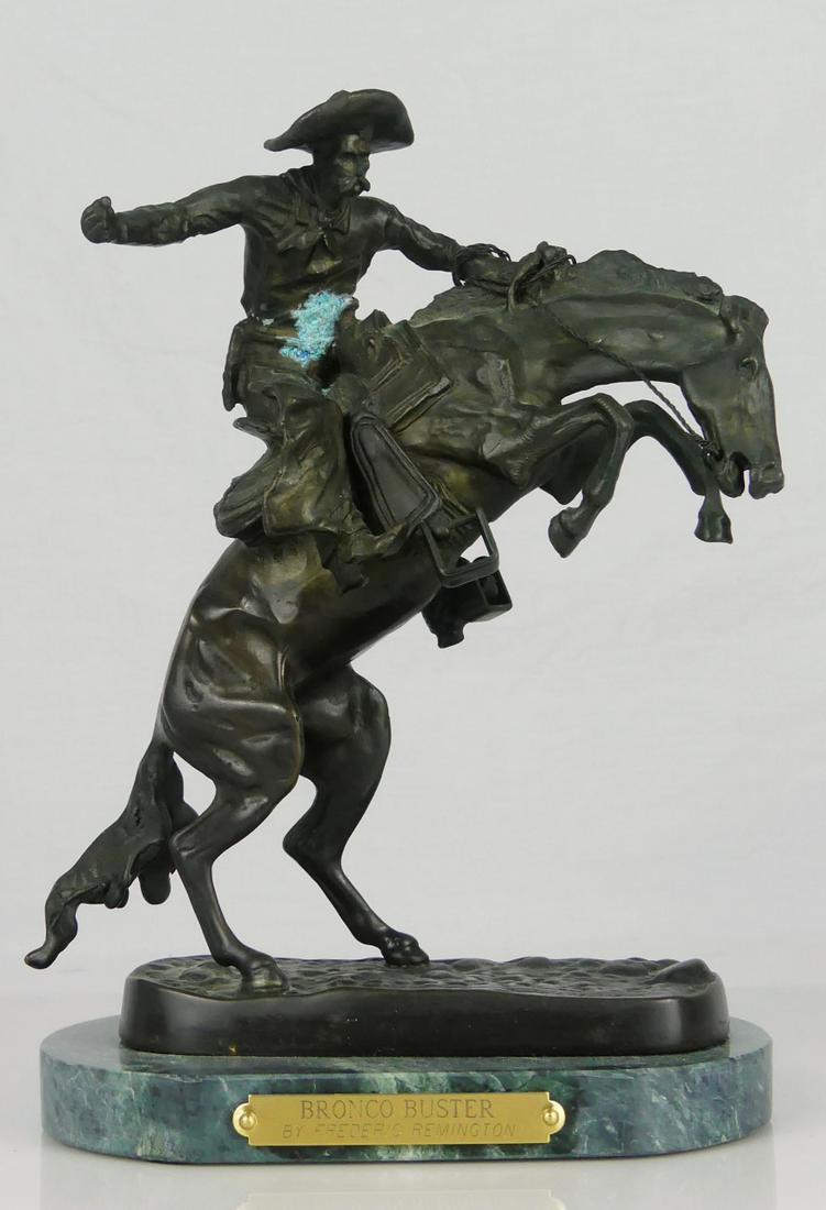 BRONCO BUSTER BRONZE AFTER FREDERIC REMINGTON: Bronco Buster bronze sculpture after Frederic Remington. Signed to bronze base. Measures 6" width x 8" height + 5/8" marble base.