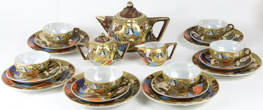 21pc JAPANESE SATSUMA PORCELAIN TEA SET: 21 piece Japanese Satsuma porcelain tea set. Includes teapot-8 3/4", sugar-6", creamer-4 3/4", 6 teacups-4 1/4", 6 saucers-5 3/8" and 6 dessert plates-7 3/8". Each signed to underside.